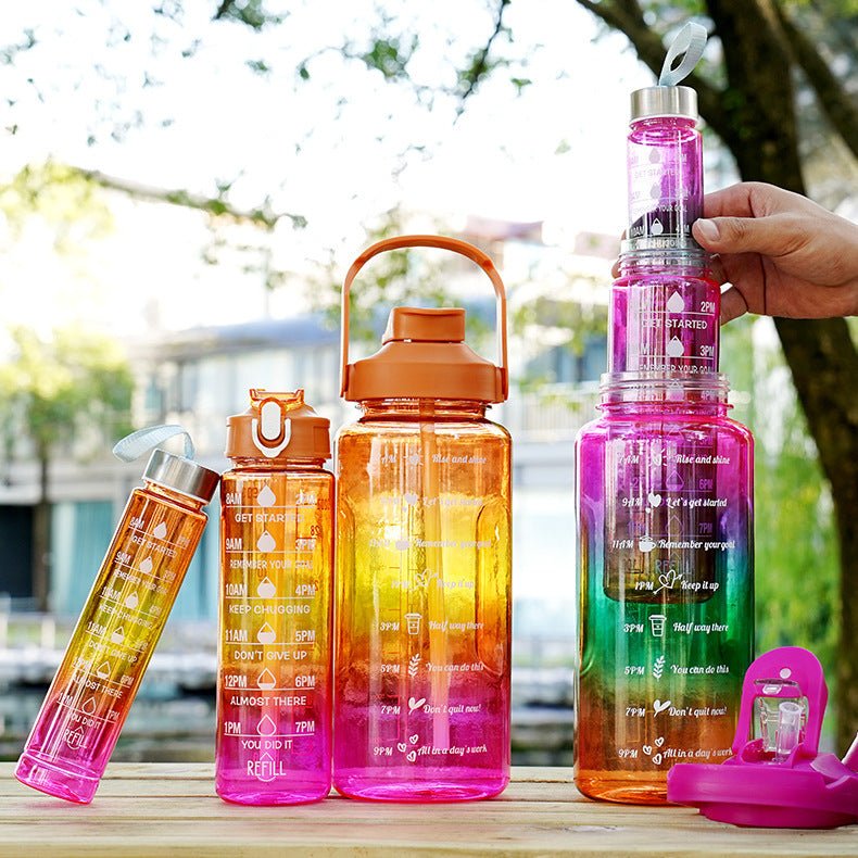Gradient motivational water bottle set with straw in multiple sizes for sports and outdoor hydration
