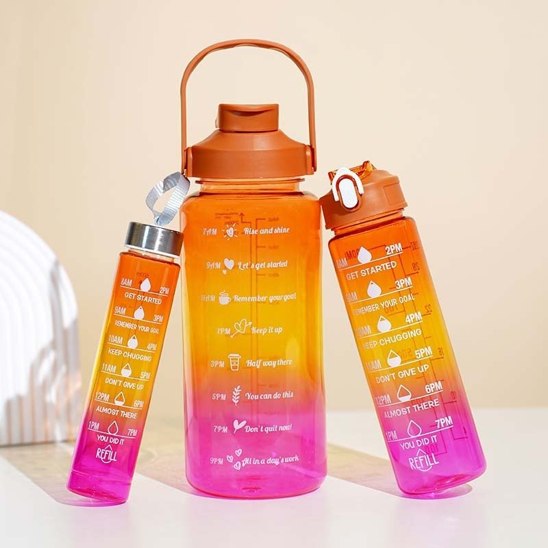 Gradient motivational water bottle set with straw in multiple sizes for sports and outdoor hydration