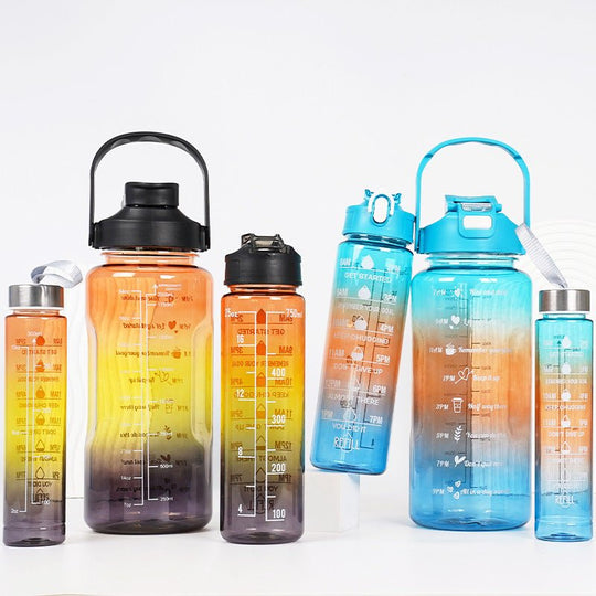 Gradient motivational water bottle set with straw in multiple sizes for sports and outdoor hydration