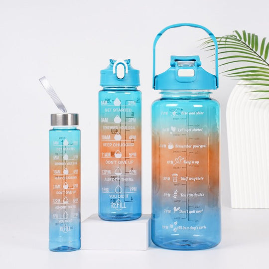Gradient motivational water bottle set with straw in multiple sizes for sports and outdoor hydration
