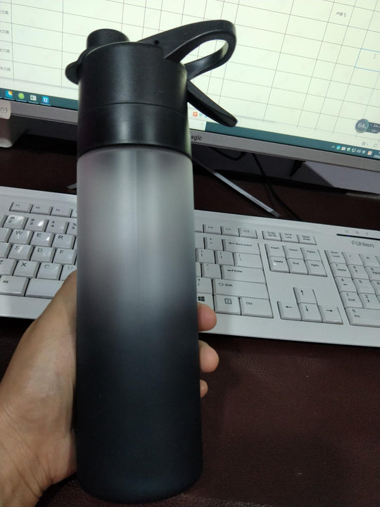 spray water bottle with handle strap for fitness and travel